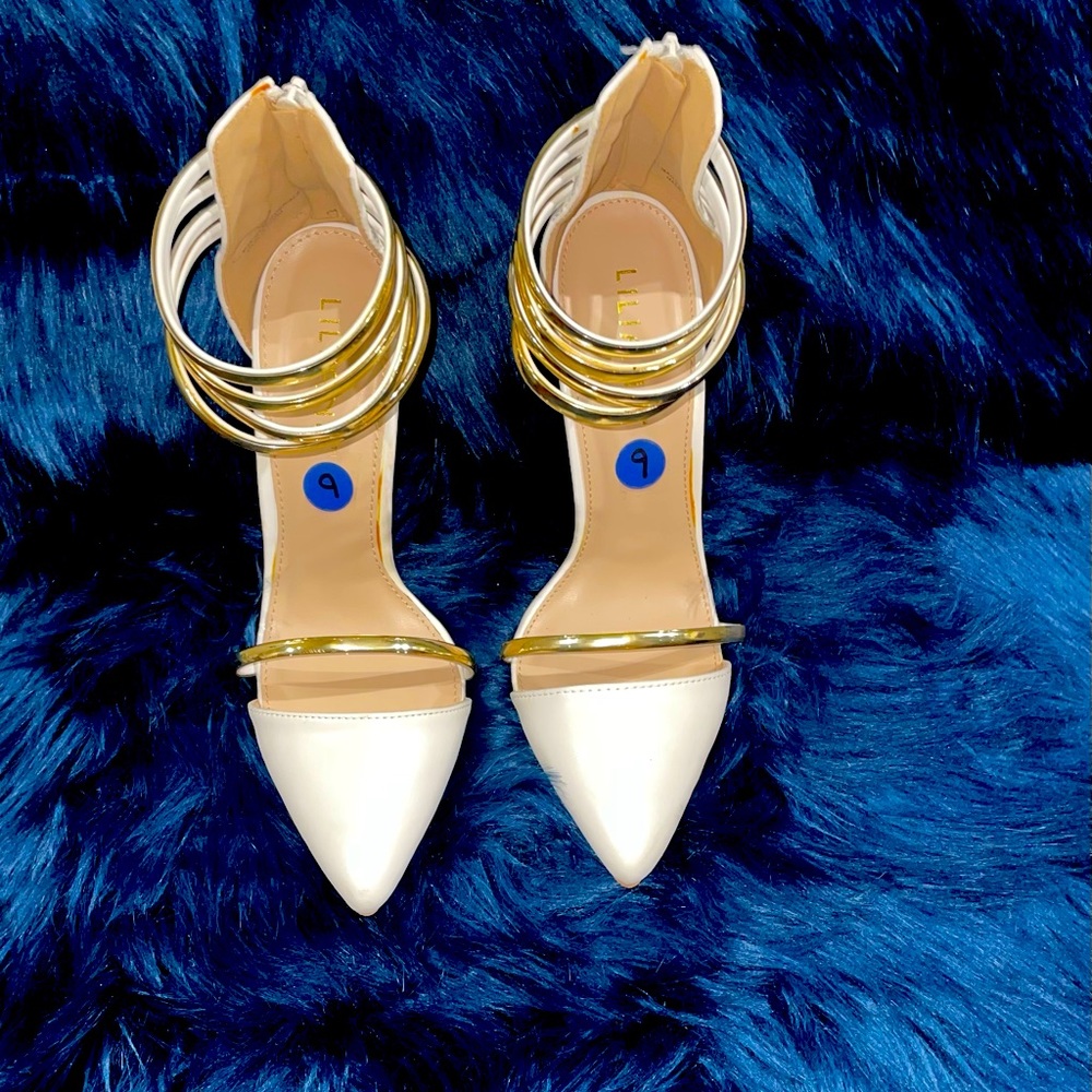 White heels with gold bangle bands